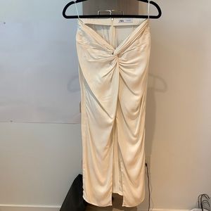 Zara Twisted front silk skirt, with hidden zipper in the back.